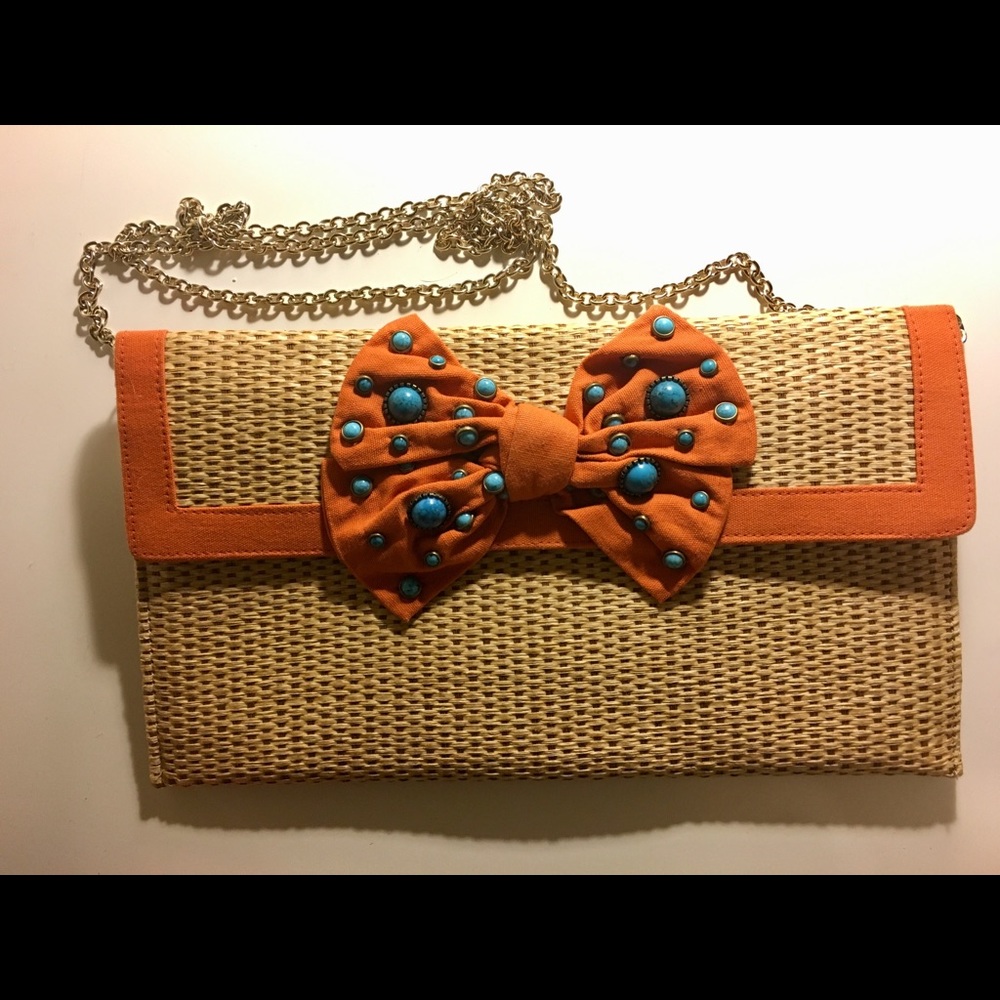 Simple straw clutch with cute details.